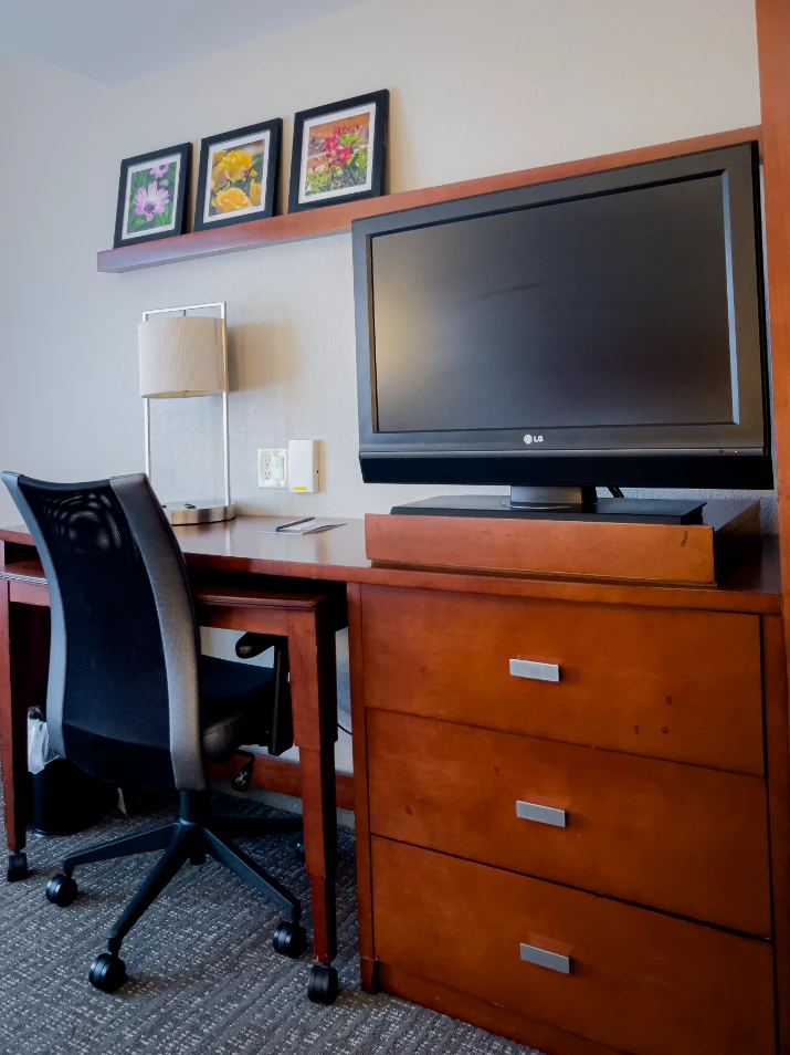 room workstation at the Courtyard by Marriott Stuart room workstation at the Courtyard by Marriott Stuart showing the desk and swivel chair giving comfort to al travelers